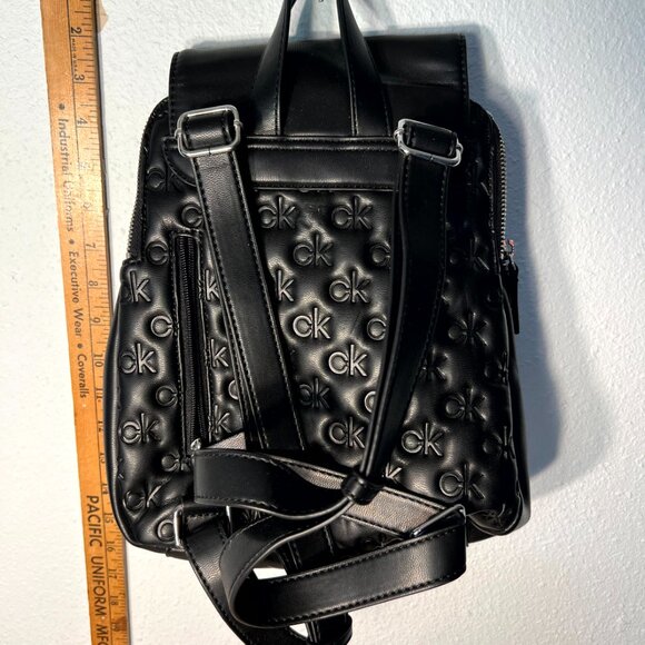 Calvin Klein Women's Black Reyna Signature Embossed Key Item Flap Backpack - Picture 6 of 6